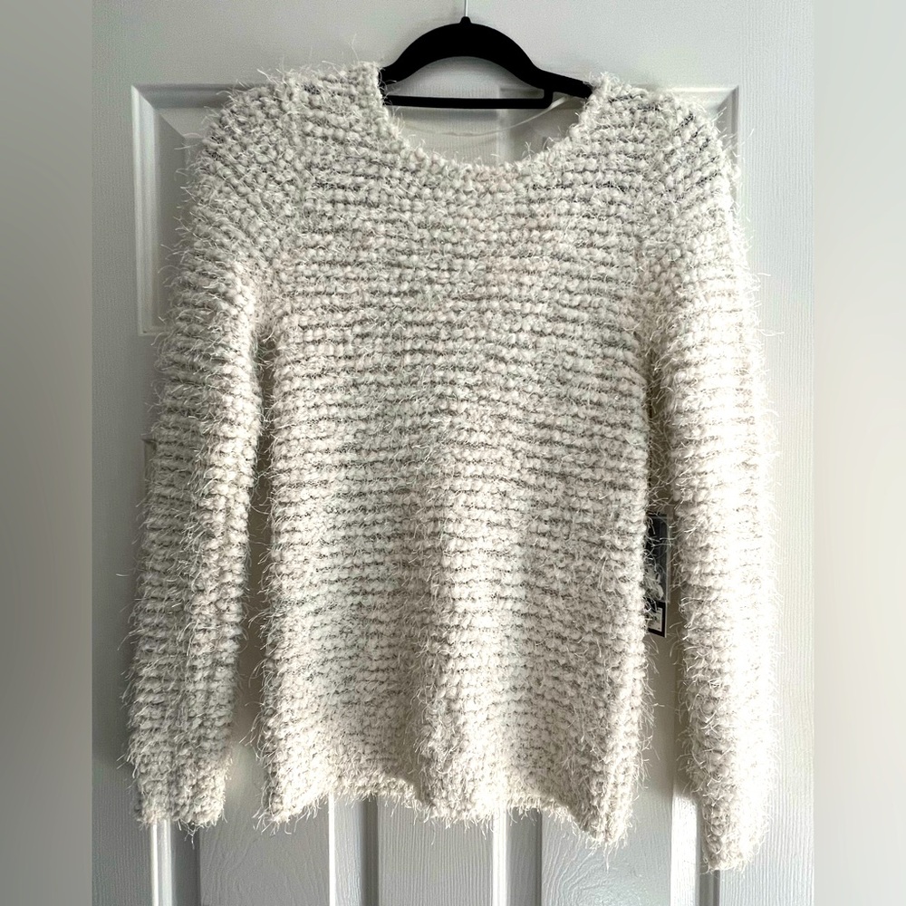 NWT-Jennifer Lopez gilded glamour crew neck long sleeve in size XS.